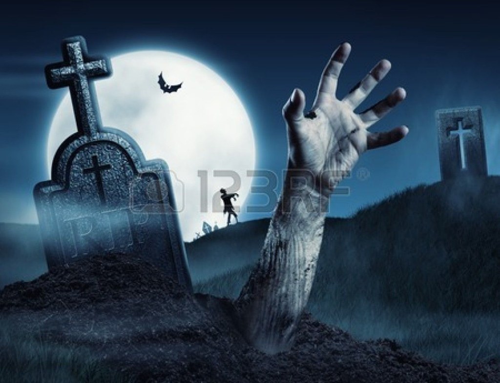 Picture of: Zombie hand coming out of his grave